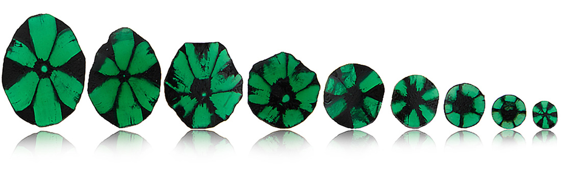 Green EMERALDS of different shapes and sizes